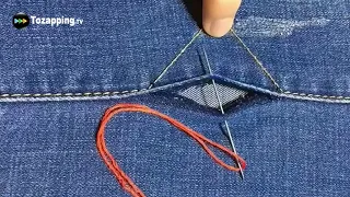 Tozapping.tv cómo coser manualmente las costuras laterales de un pantalón vaquero descosido utilizando el hilo original